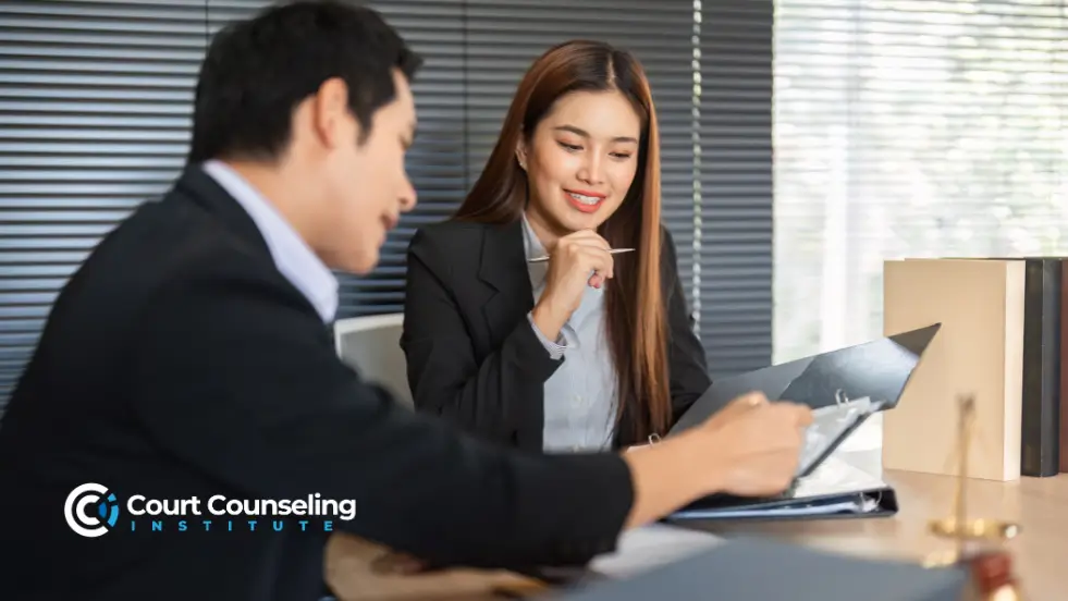 Legal team and counselor reviewing contracts in an office setting