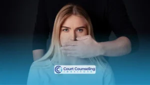 Crying woman with her face in her hands, symbolizing trauma from sexual misconduct.