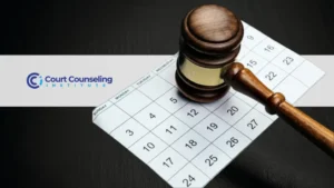 Judge’s gavel placed on top of a calendar, symbolizing an upcoming court schedule.