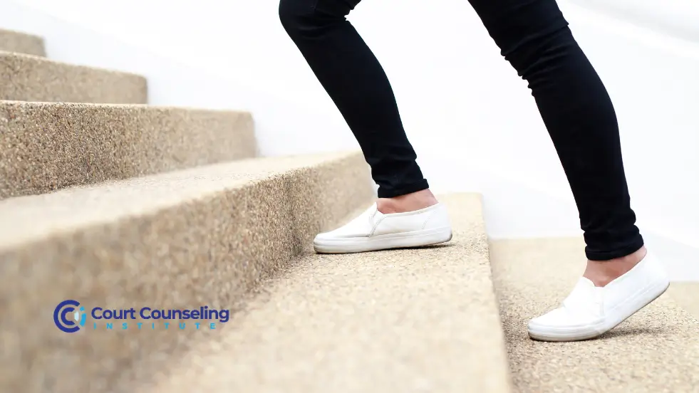 Person achieving progress and healing through guided court related therapy.